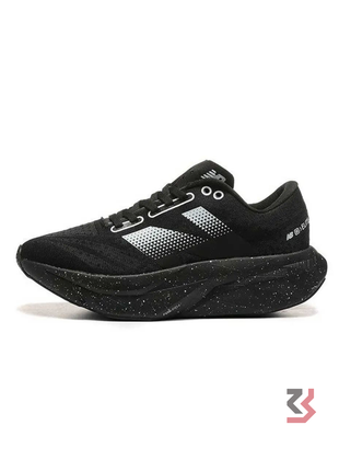 New Balance FuelCell Rebel v4 in a "Magnet Black”