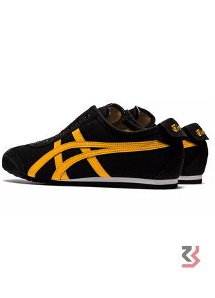 Onitsuka Tiger Mexico 66 Slip-On sneaker in black with tiger yellow stripes